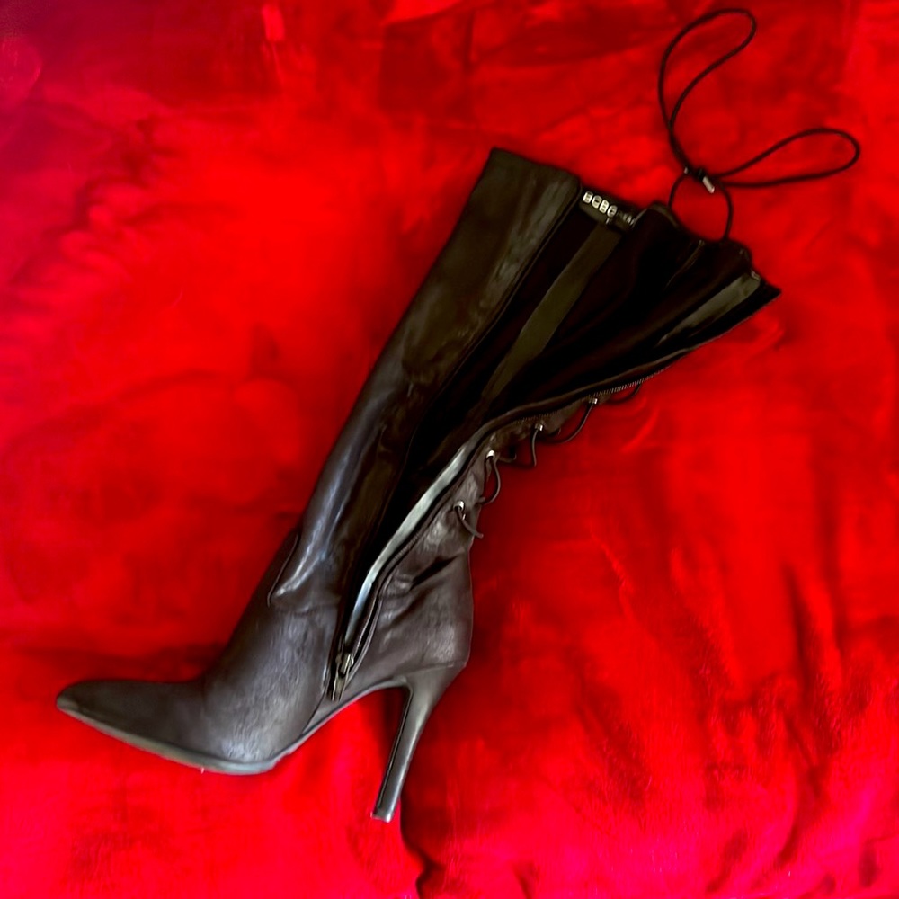 Black color sexy 4” heel boots with straps on the back to fit tight on your leg